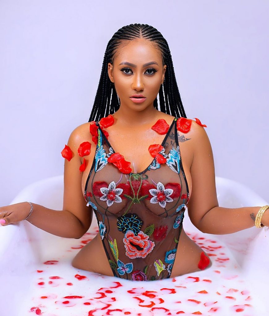 Hajia For Real took a shot during the Vals day where she posed in a Jacuzzi with red flowers spread on her 